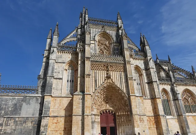 Main facade of the Batalha Monastery, in Manueline Gothic style