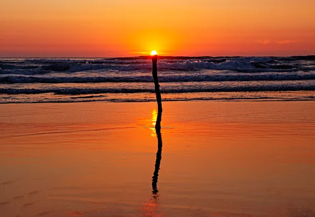 Sunset at Praia do Cabedelo beach in Figueira da Foz