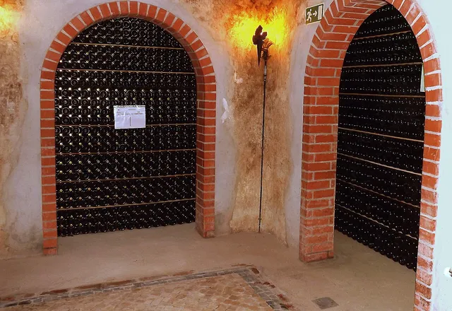 Sparkling wine bottles ageing in the cellars of Cantanhede, in the Bairrada region